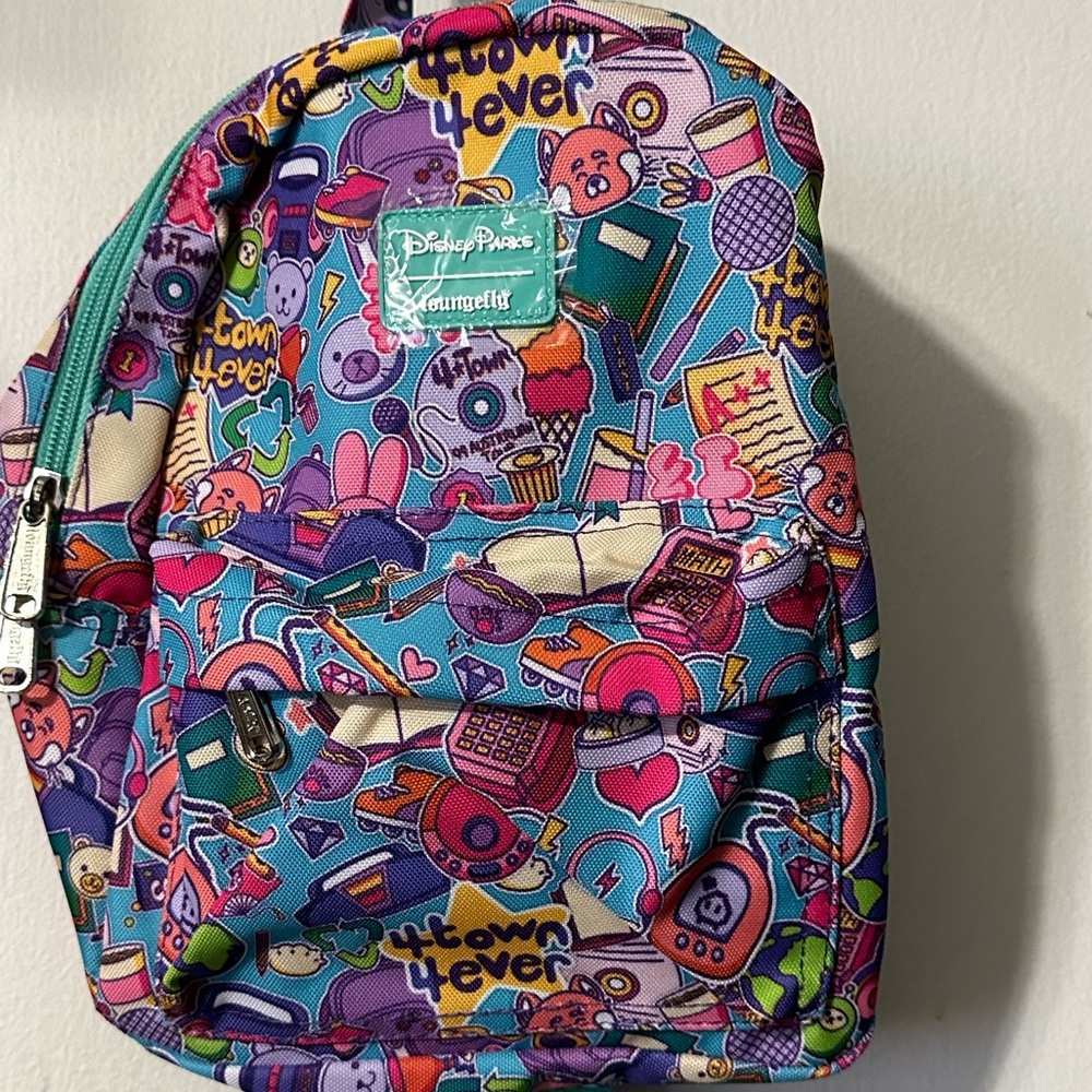 Disney Park loungefly, mini backpack pixie, turning red panda multi colors,